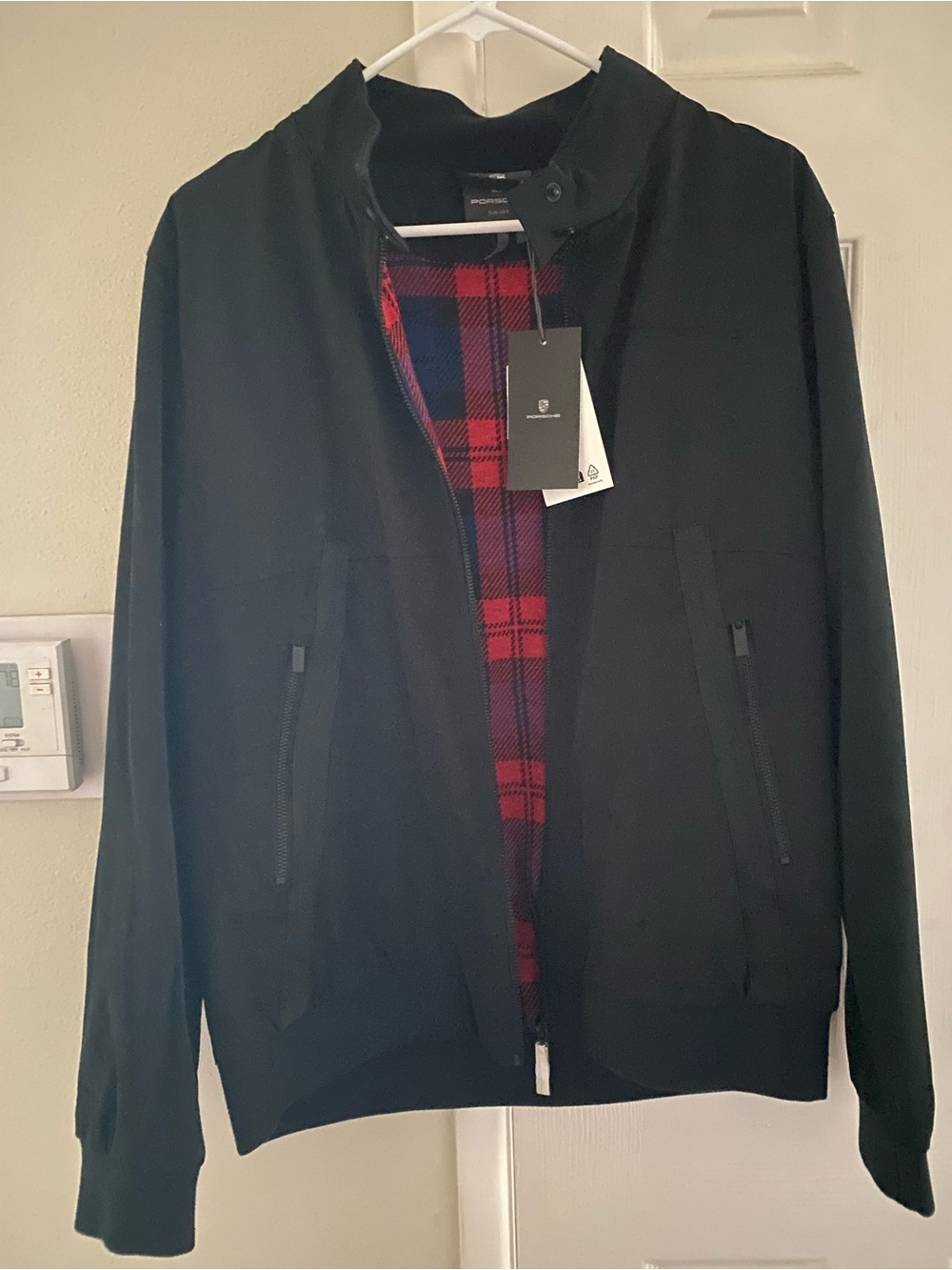 New with tags Porsche Men's Black Bomber Sweater with Red Plaid Lining